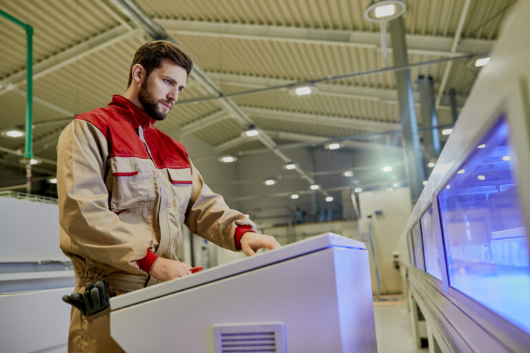 view worker using automated woodworking machine production facility